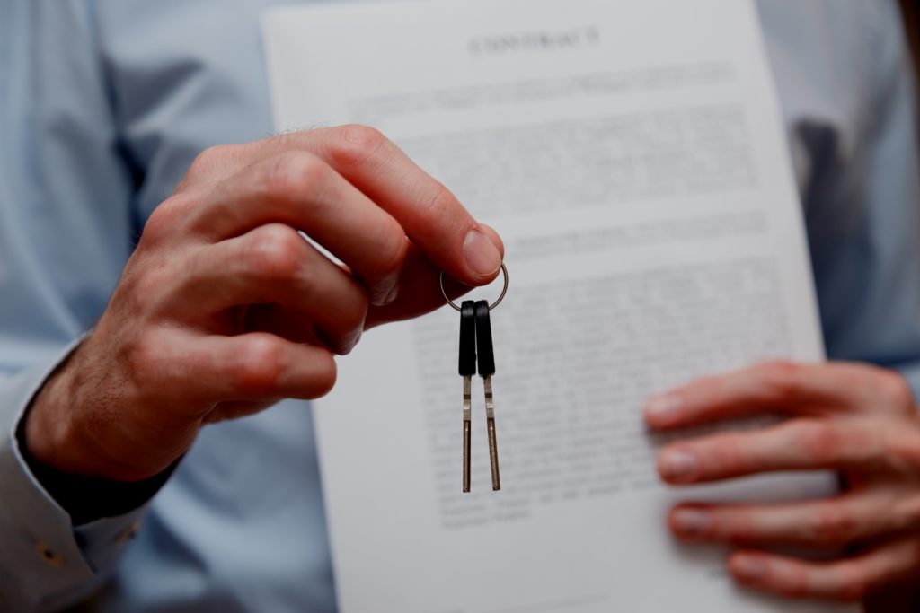 person holding keys